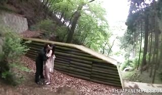 Magnificent asian gf is kneeling on the floor and sucking sausage